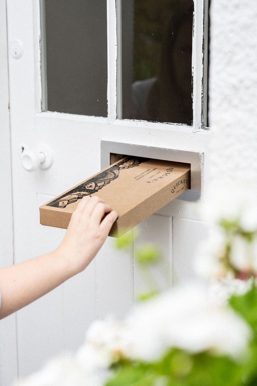 Quickes cheese picnic letterbox posted through a door